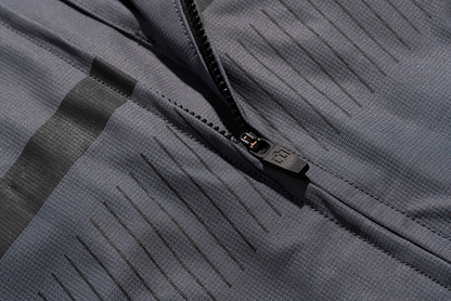 Gray ICON PDX3™ Jacket in 2XL, featuring a sleek design with visible front zipper, pockets, and adjustable cuffs.