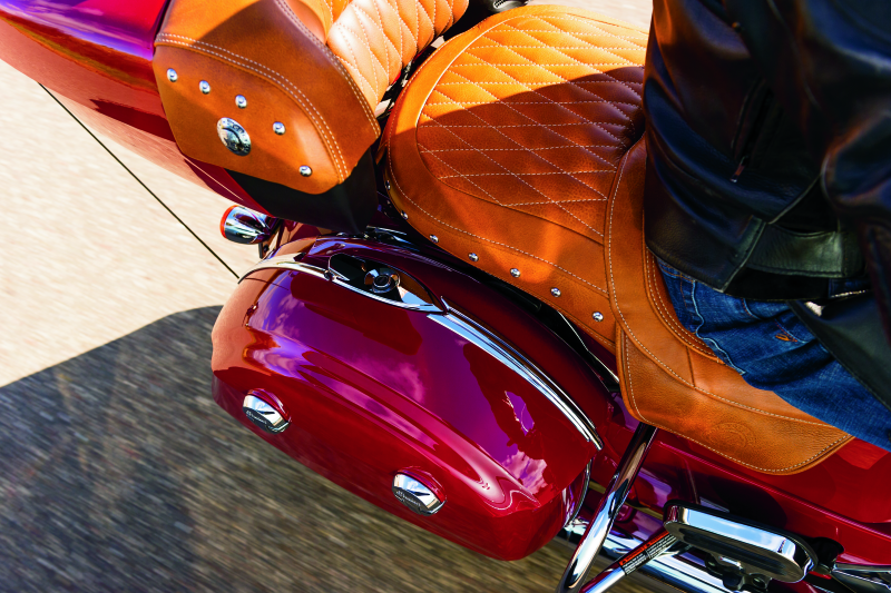 Kuryakyn chrome saddlebag top trim for Indian Chieftain, Roadmaster, Springfield motorcycles, showcasing shiny chrome finish and fitting details.