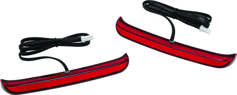 Kuryakyn Tracer Saddlebag Lights with red lenses installed on Harley Davidson Touring motorcycle for enhanced visibility.