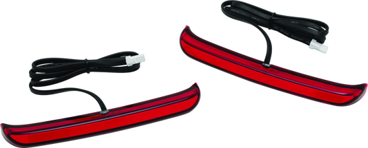 Kuryakyn Tracer Saddlebag Lights with red lenses installed on Harley Davidson Touring motorcycle for enhanced visibility.