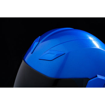 Blue ICON Airflite™ helmet with Jewel design, MIPS® safety system, shown in XL size with aerodynamic shape and ventilation vents.
