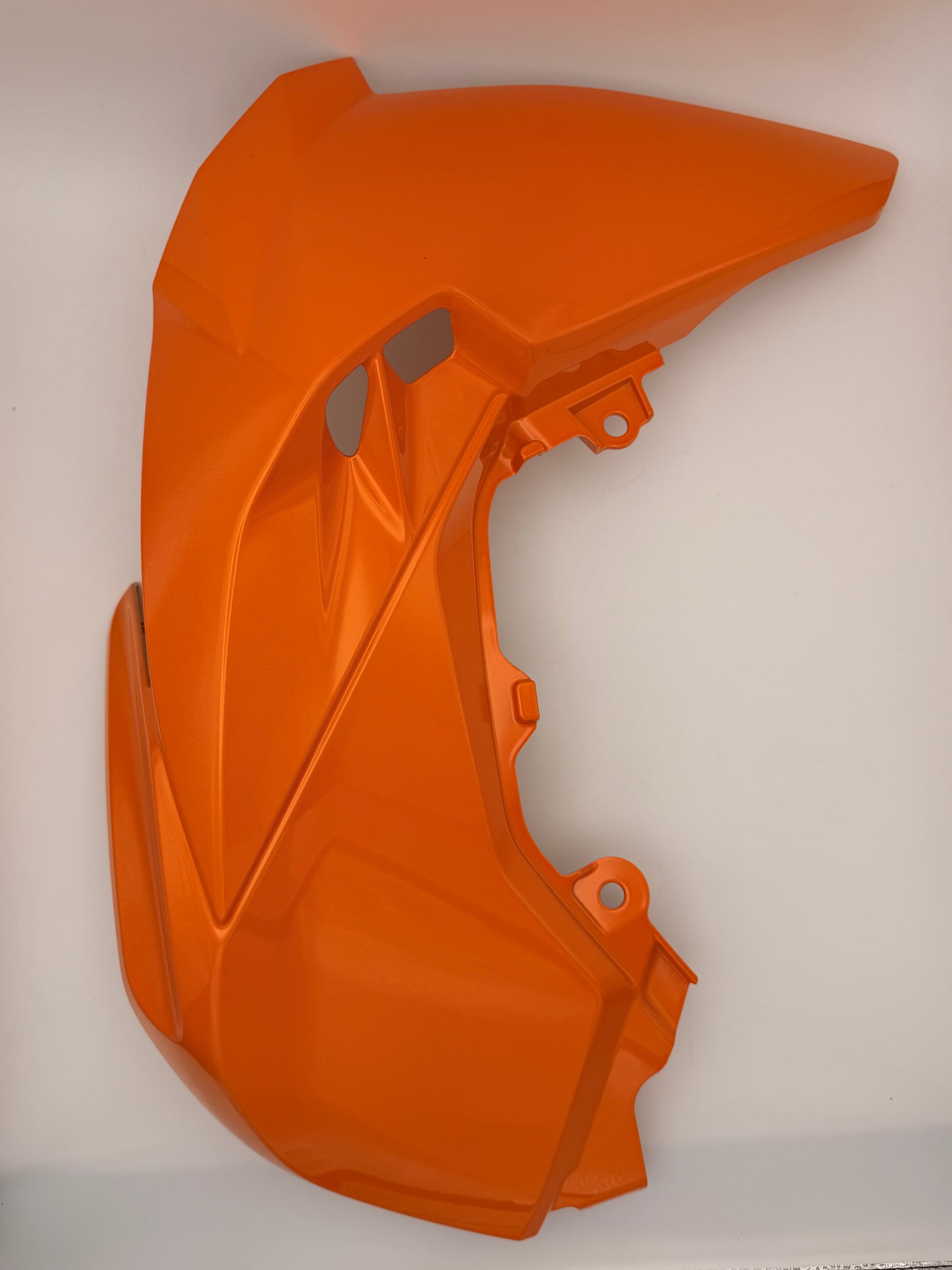 Kawasaki Z125 genuine OEM left and right tank shrouds, motorcycle frame and body parts, black plastic covers.