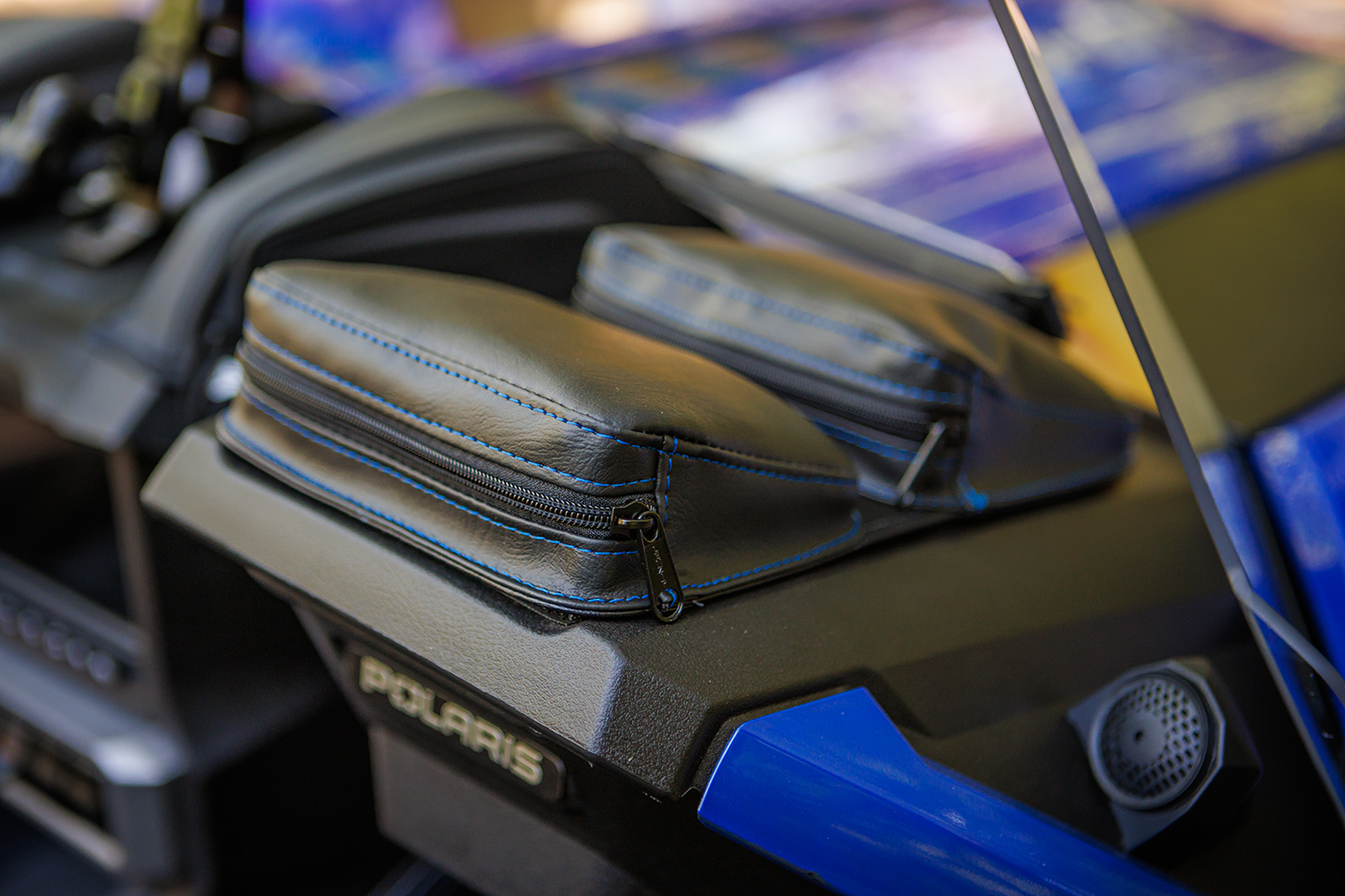 Black SHOW CHROME Kaliber Dash Pouch with blue stitching for engine accessories, designed for easy storage and access.