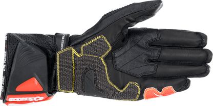 Alpinestars GP Tech V2 S motorcycle gloves in black, white, and fluo red with padding and branding details.
