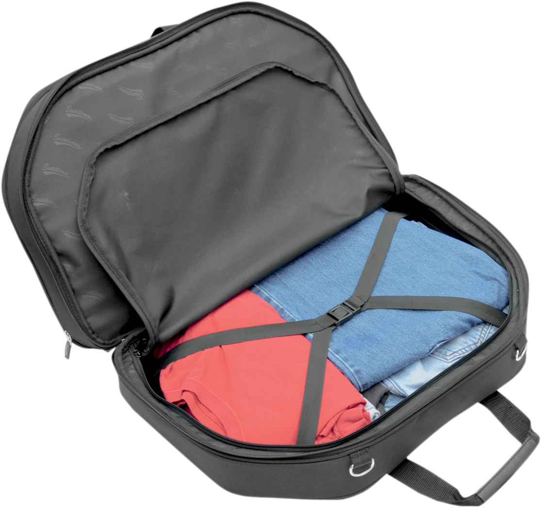 Bill's Exhausts Saddlemens Tour-Pak luggage bag attached to motorcycle seat for secure storage, black weather-resistant material.