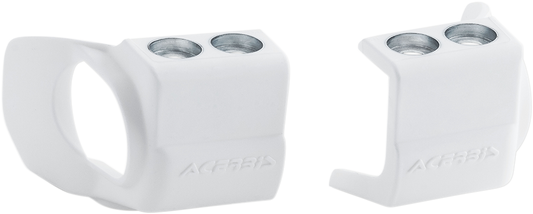 White Acerbis shoe protectors for inverted forks, designed to shield motorcycle fork bodies, by Bill's Exhausts.