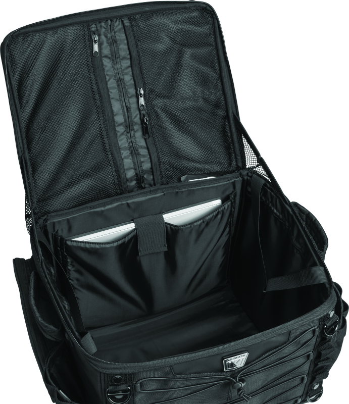 Kuryakyn Momentum Vagabond Bag attached to motorcycle seat and luggage rack for versatile storage and travel convenience.