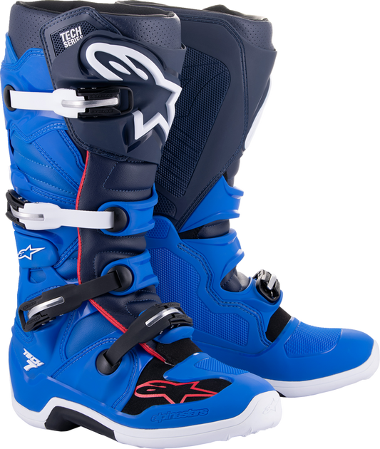 Alpinestars Tech 7 motocross boots in blue, red, and navy, US size 7, with sturdy design and protective features.