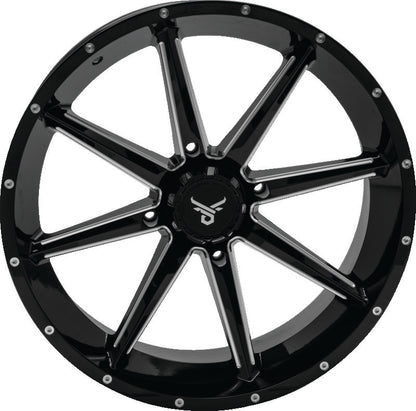 QuadBoss Slicer 20x7 PowerSports wheel with limited edition bull logo center caps, featuring rugged design and aggressive style.