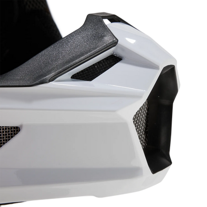Fox V1 Core MIPS motocross helmet by Howling Moto with DOT certification, featuring a sleek design and secure chin strap.