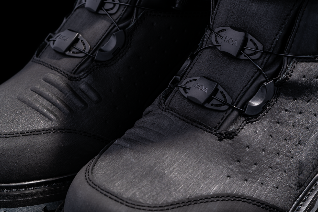 Black ICON Alcan waterproof boots by Bill's Exhausts in size 7, featuring durable leather and sturdy rubber soles.