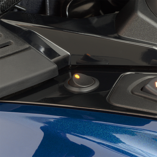 Black SHOW CHROME Can-Am driving light kit with engine mounting, featuring compact design and sturdy construction for off-road vehicles.