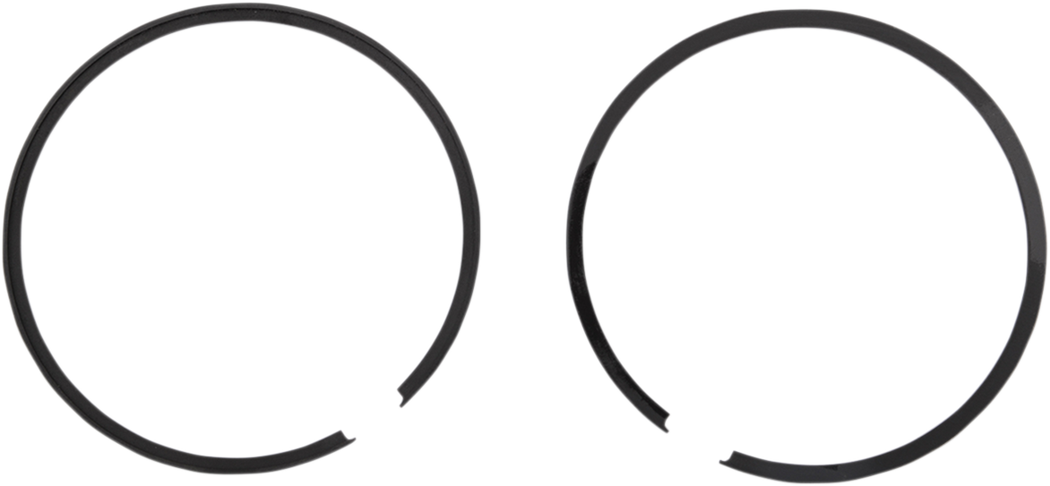 PARTS UNLIMITED piston ring set R09-7412 for engine repair, showing metal rings arranged on a white background.