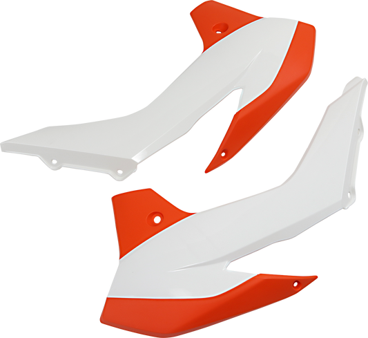 Acerbis orange and white radiator shrouds for motorcycle body protection, featuring bold color accents and aerodynamic design.