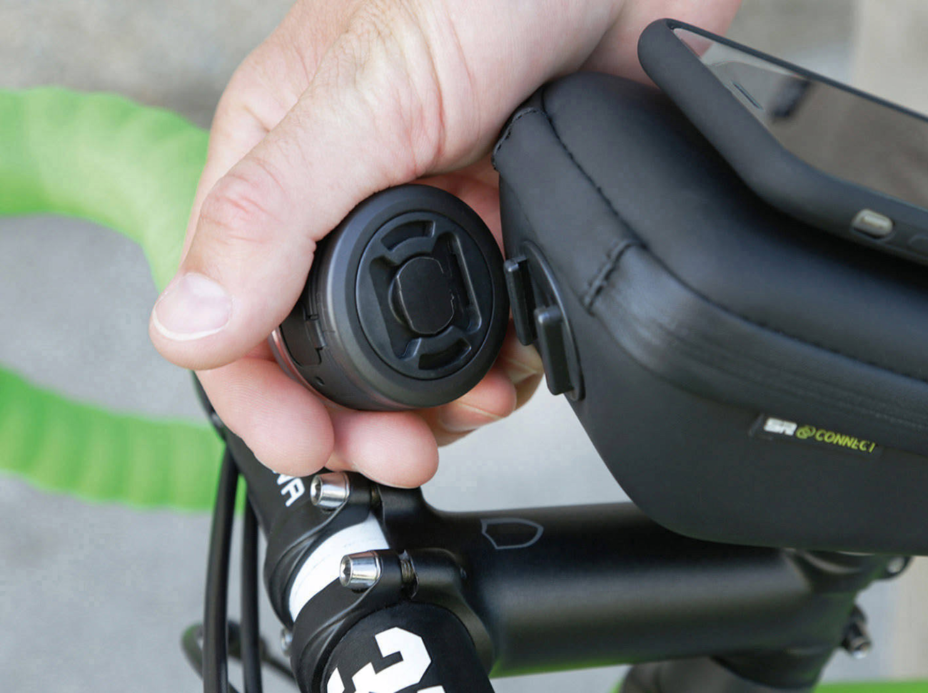 Bill's Exhausts SP CONNECT All-Round LED Light for phones, 200 lumens, mounted on a phone with visible mounting accessories.