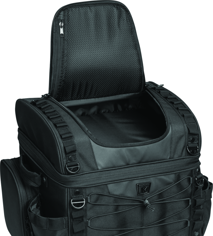 Kuryakyn Momentum Vagabond Bag attached to motorcycle seat and luggage rack for versatile storage and transport.