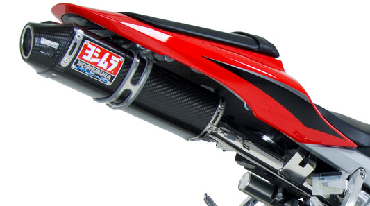 YOSHIMURA RS-5 Slip-On SS CF exhaust for UTVs, showing the stainless steel and carbon fiber finish on the motorcycle exhaust system.
