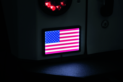 Black Kuryakyn Freedom Flag LED light for 4x6 inch powersports vehicles, featuring vibrant LED illumination and durable design.