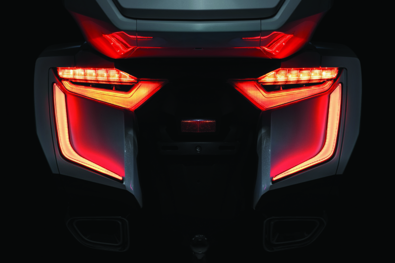 Kuryakyn Omni LED rear bag accents on a Honda GL1800 Gold Wing motorcycle, showcasing sleek LED lighting details.
