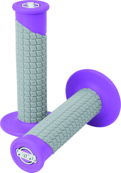 Bill's Exhausts ProTaper clamp-on pillow top grips in neon purple and gray, showing textured rubber surface and ergonomic design.
