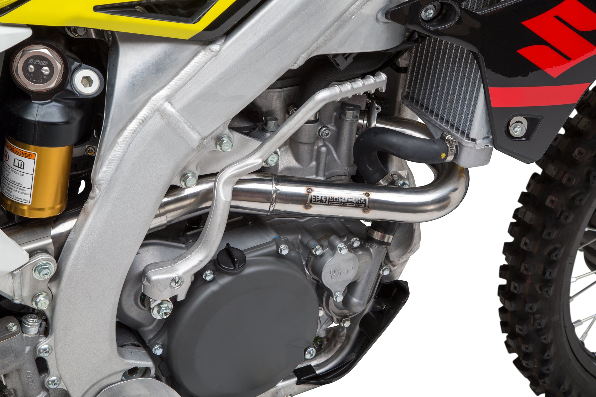 YOSHIMURA RS-12 Signature Series dirt bike exhaust system with stainless steel aluminum and carbon fiber end cap, mounted on a dirt bike