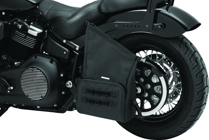 Kuryakyn Hoodrat Universal Swingarm Bag for powersports equipment shown on motorcycle with black exterior and mounting straps.