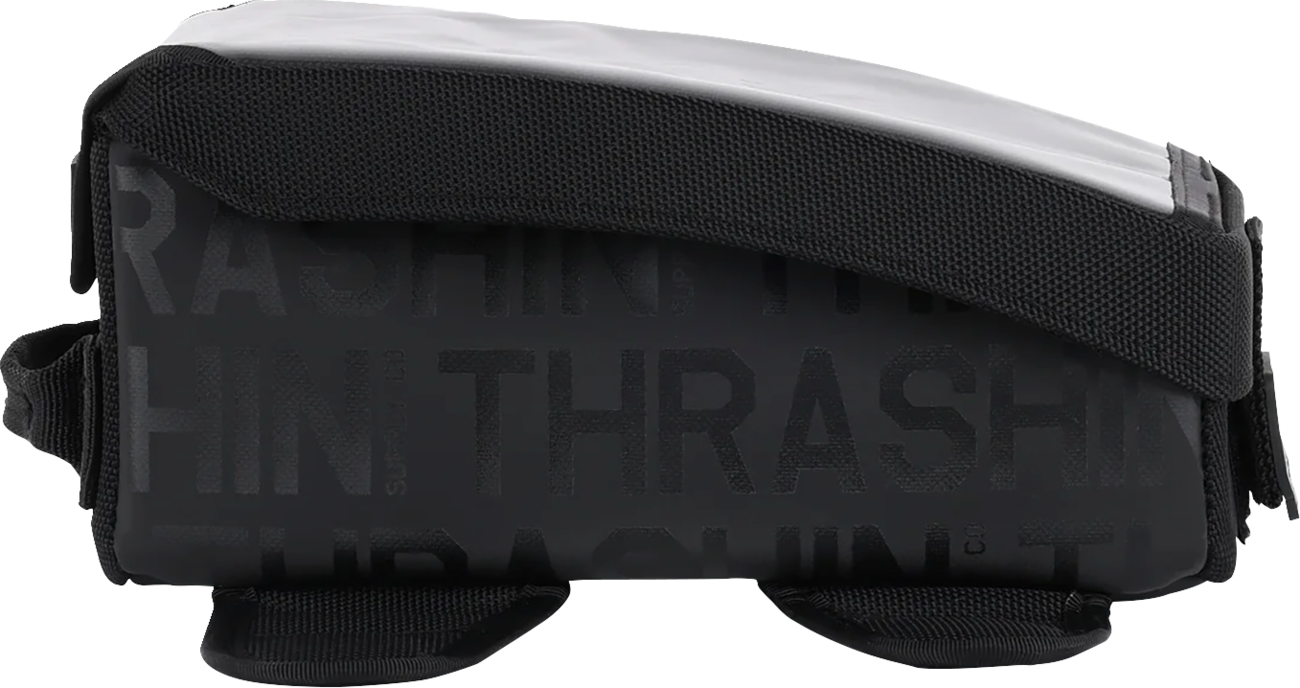 Black THRASHIN SUPPLY CO. 3.5L magnetic tank bag with secure straps for motorcycles, shown attached to a fuel tank.