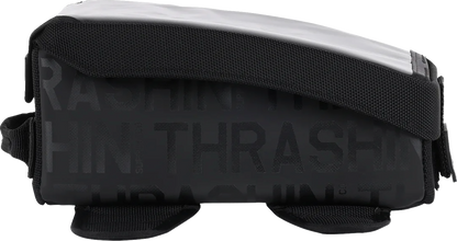 Black THRASHIN SUPPLY CO. 3.5L magnetic tank bag with secure straps for motorcycles, shown attached to a fuel tank.
