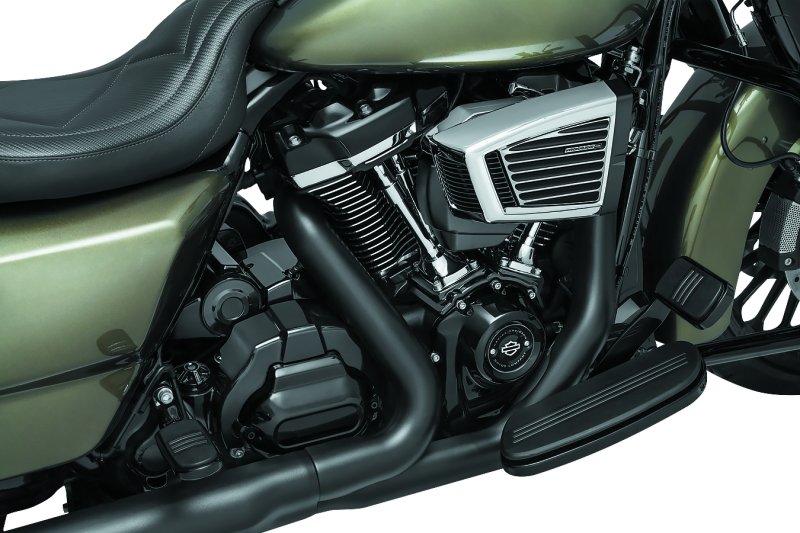 Black Kuryakyn Precision Transmission Top Cover for Harley-Davidson motorcycle, showcasing a sleek, durable metal finish.