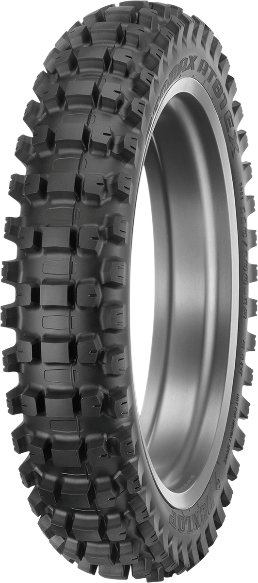 Dunlop Geomax AT81 EX rear off-road tire with 110/100-18 size and 64M load rating, designed for endurocross performance.