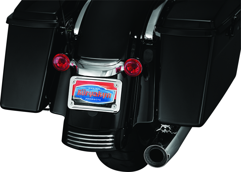 Chrome Kuryakyn curved license plate mount for Harley-Davidson Street Glide and Road Glide motorcycles.