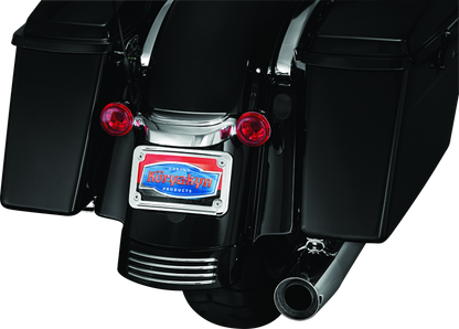 Chrome Kuryakyn curved license plate mount for Harley-Davidson Street Glide and Road Glide motorcycles.