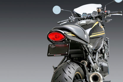 YOSHIMURA Yoshimura V2 Fender Eliminator Kit installed on a Kawasaki motorcycle, showcasing sleek design and mounting hardware.