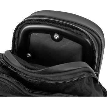 Black Saddlemens Fundamentals Sissy Bar Bag mounted on motorcycle seat, showcasing durable storage for bike accessories