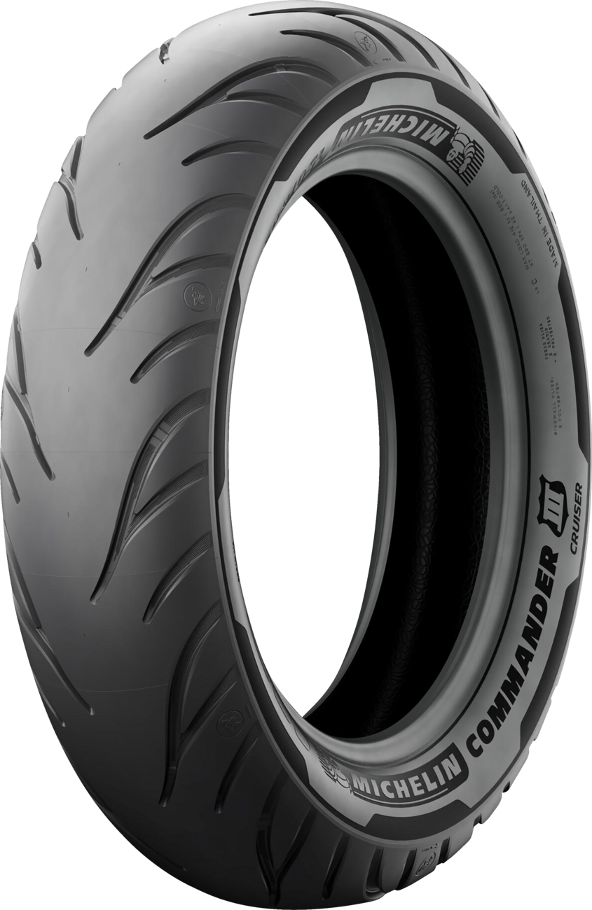 Rear Michelin Commander III motorcycle tire in 130/90B16 size with 73H load index, featuring deep tread pattern and sidewall branding.