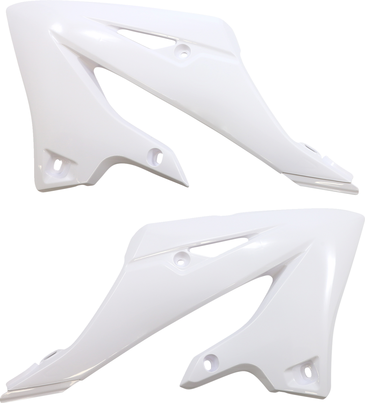 White Acerbis standard replacement body kit for motorcycles, shown on a worktable with tools and parts.