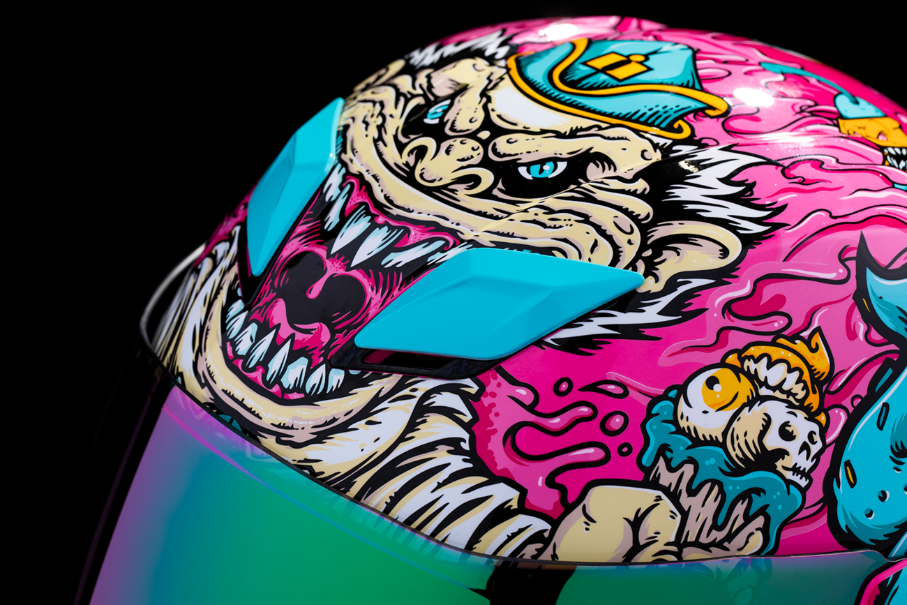 Pink ICON Airflite™ Helmet with Snack Attack design, Small size, MIPS® safety system, featuring aerodynamic vents and visor.