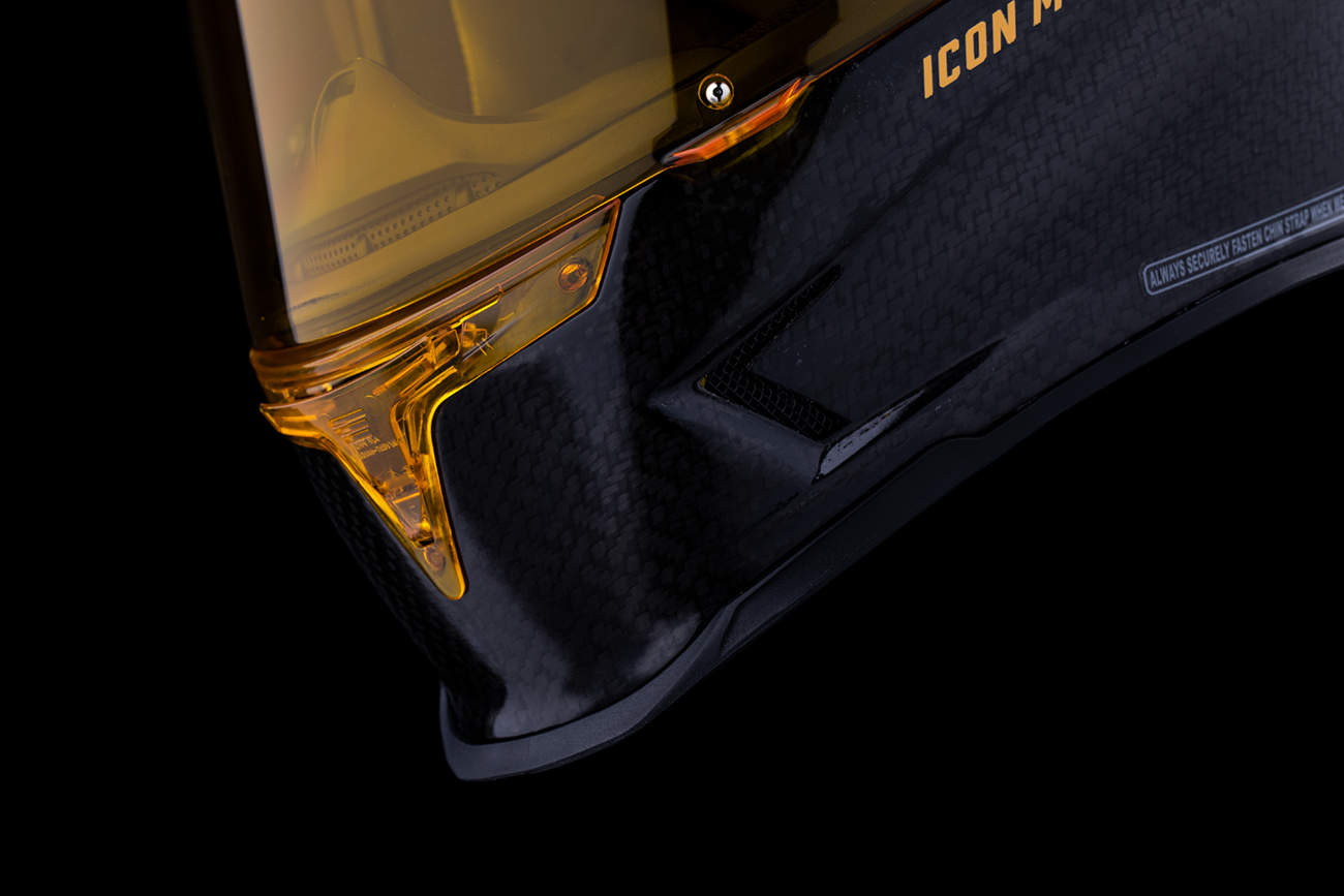 Yellow ICON Airframe Pro™ helmet with carbon shell, XL size, featuring aerodynamic design and venting, for motorcycle riding safety.