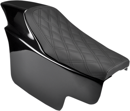Vintage saddle seat with lattice stitching, SADDLEMEN Z4211 style, featuring detailed craftsmanship on a classic motorcycle seat.