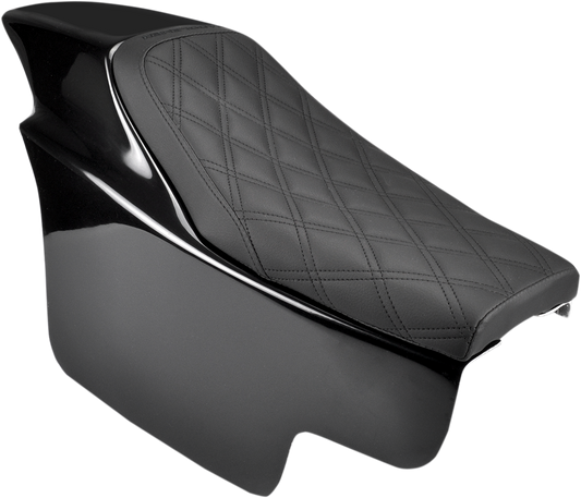Vintage saddle seat with lattice stitching, SADDLEMEN Z4211 style, featuring detailed craftsmanship on a classic motorcycle seat.