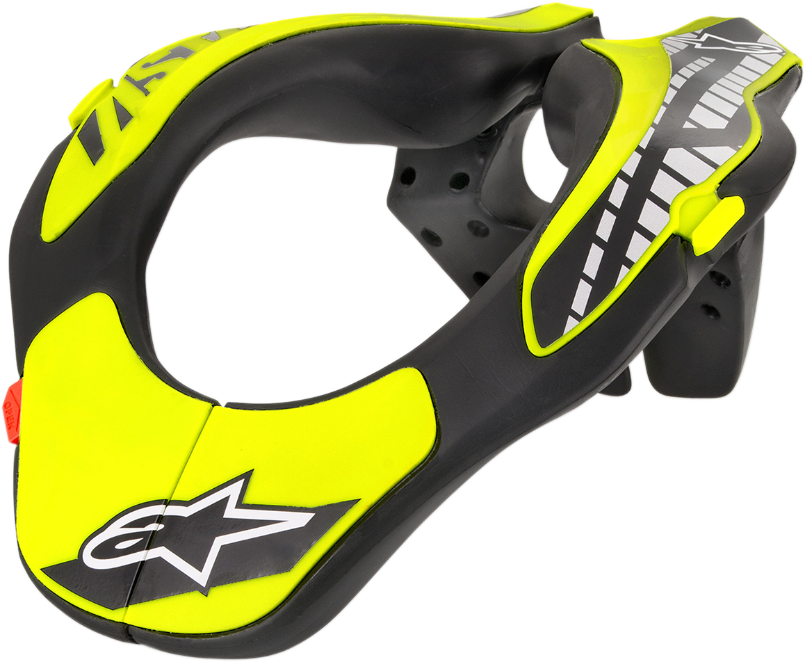 Alpinestars youth neck support in black and yellow fluo, designed for helmet safety, shown on a plain background.
