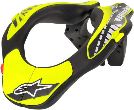 Alpinestars youth neck support in black and yellow fluo, designed for helmet safety, shown on a plain background.