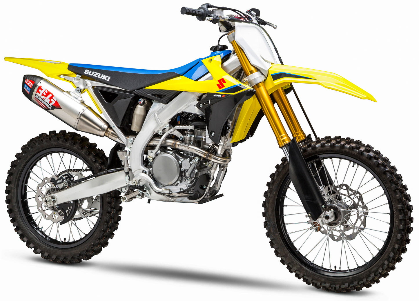 YOSHIMURA RS-12 Signature Series dirt bike exhaust system with aluminum and carbon fiber components on a motorcycle.