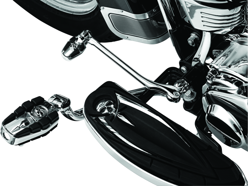 Kuryakyn Zombie shift peg for Harley-Davidson, chrome finish with detailed zombie design on motorcycle foot peg.