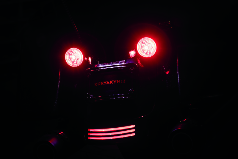 Kuryakyn 1157 Red/Red LED bulb for powersports dual function replacement showing the red LED light and bulb base