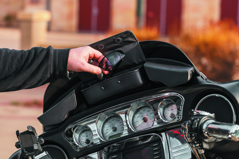 Kuryakyn Batwing fairing pouch bag mounted on a Harley Davidson 2014-2015, showing the compact storage design for motorcycle fairings.