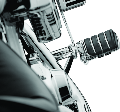 Chrome Kuryakyn Switchblade motorcycle foot pegs with male mount adapter for Harley and metric bikes, featuring sleek design and sturdy build.