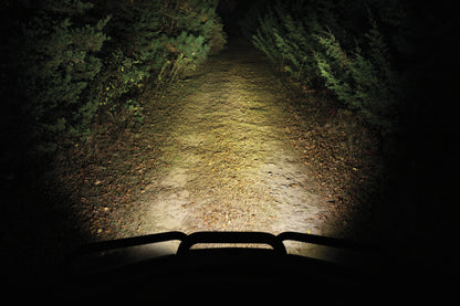 Kuryakyn Lodestar 750L Spot Beam Driving Lights installed on a powersports vehicle, showcasing high-output auxiliary lighting.