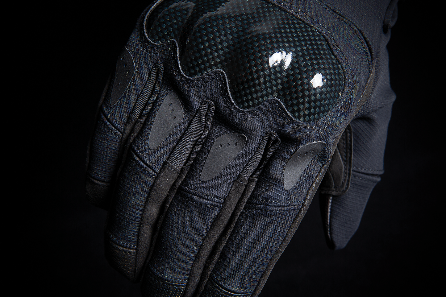 Black ICON Stormhawk™ gloves in 3XL size, showing the durable motorcycle glove with textured grip and reinforced knuckles.