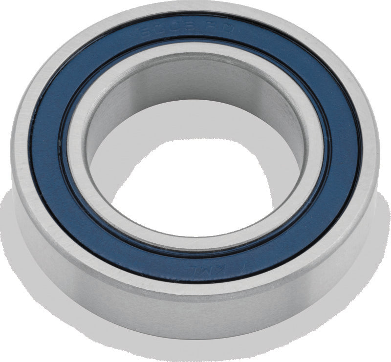 QuadBoss 6001-2RS bearing, high-speed precision power sports component, visible in close-up with metal casing and roller elements.